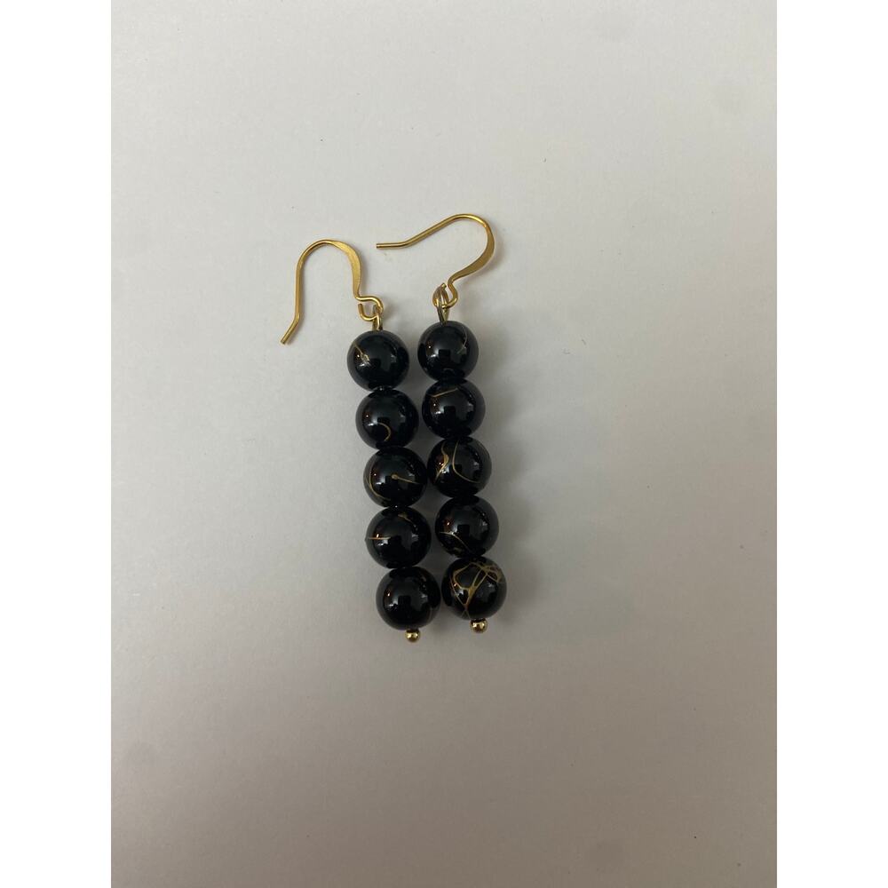 Handmade black onyx earrings with gold accent